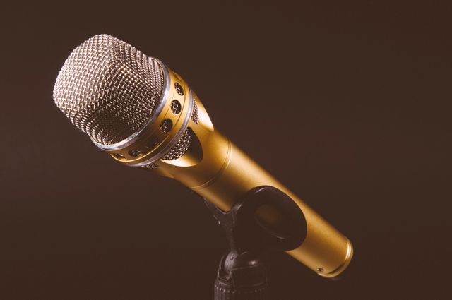 Retro And Vintage Microphone On Stage With Bokeh Light 